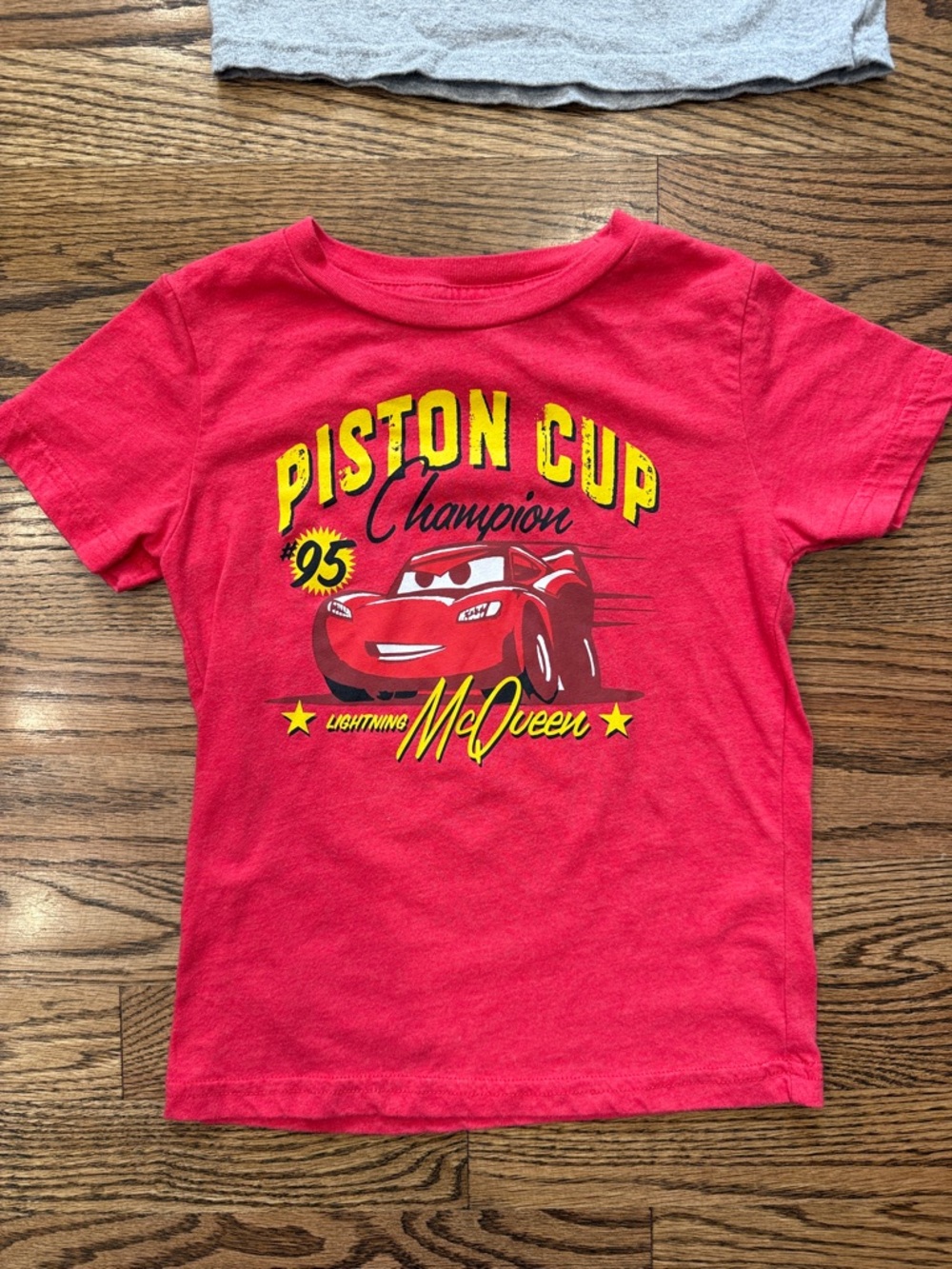 Disney Cars Gray & Red Radiator Springs and Piston Cup Kids Tops - Picture 2 of 6